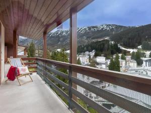 a balcony with a view of a snowy mountain at Apartment La Marmotta by Interhome in Madesimo