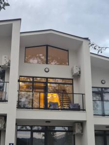 a building with a staircase in the middle of it at Gonik NN Apartmani in Veliko Gradište