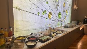 a buffet line with many different types of food at La Clef des Champs - Proche Colmar in Biesheim
