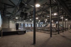 an empty arena with a stage and rows of seats at Norefjell Ski & Spa in Noresund