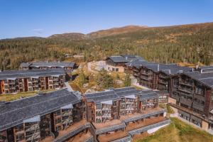 an aerial view of a resort with mountains in the background at Norefjell Ski & Spa in Noresund