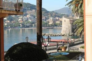a view of a body of water with a castle at Villa Cristina in Rapallo