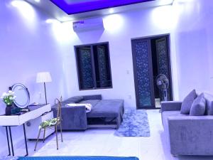 a living room with a couch and a table at Homestay giữa trung tâm Hải Phòng in An Dương
