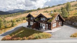 an overhead view of a house with a grass roof at Rauland Feriesenter in Rauland