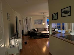 a living room with a couch and a table at Perfect location ski-in Åre in Åre