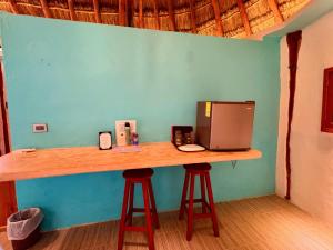 Comodidades para preparar café e chá em Cabanas Jaalkab