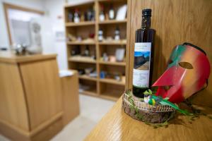a bottle of wine sitting on top of a table at Casa do Pôr do Sol in Macedo de Cavaleiros