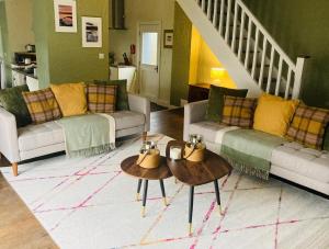 a living room with two couches and a table at 4 Bed in Derrylin oc-k35059 in Derrylin