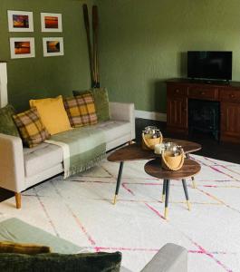 a living room with a couch and two tables at 4 Bed in Derrylin oc-k35059 in Derrylin
