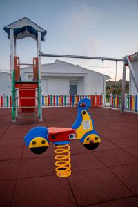 a small childs toy on a playground at Casa do Pôr do Sol in Macedo de Cavaleiros
