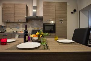 A kitchen or kitchenette at Le Cupoline