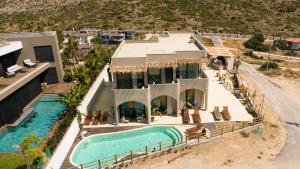 an aerial view of a house with a swimming pool at No908 Sunset HOTEL in Çeşme