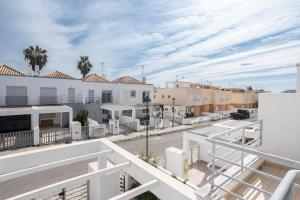 a view of a street from the balcony of a building at Montesol by ALGARVEMANTA in Manta Rota
