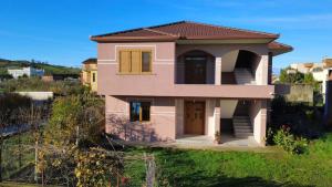 a small house with a red roof at Dreamy Heaven Escape Villa in Shijak