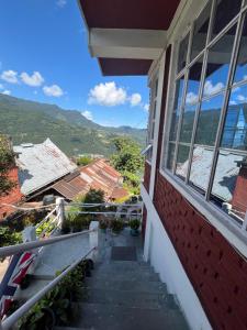 a view from the balcony of a house at Saus Home in Khonoma