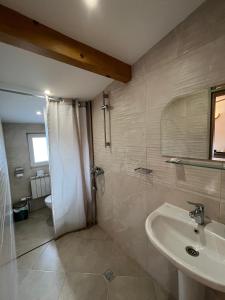 a bathroom with a sink and a shower at Hotel Four Seasons in Samokov +29 photos