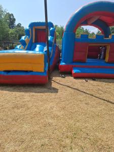 two inflatable bouncy castles on a playground at The Address Luxurious in Midrand