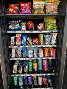 a refrigerator filled with lots of different types of drinks at AlWi Apartment Wohnung 3 in Moringen