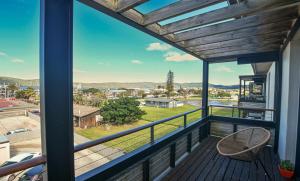 a balcony with a view of a city at The Gallery 204 Luxury Apartment in Knysna