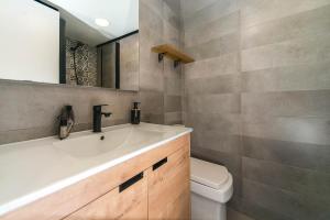 a bathroom with a sink and a toilet at WELCS APARTAMENTO 342 PDA con terraza in Platja d'Aro +5 photos