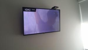 TV a/nebo společenská místnost v ubytování A Bogota On Holidays by Open - HOTEL CAS-EMBAJADA AMERICANA