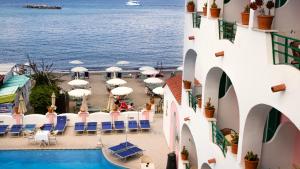 a view of the pool and ocean from the hotel at Hotel Solemare Beach & Beauty SPA in Ischia Town