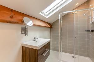 a bathroom with a sink and a shower at 2 Bed in Caldbeck oc-b38644 in Caldbeck +16 photos