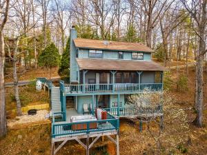 an aerial view of a house with a wrap around porch at Making Memories in Blairsville