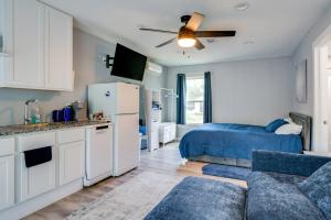 a kitchen and living room with a refrigerator and a couch at Country Hideaway For A True Getaway in Montgomery