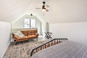 a bedroom with a bed and a couch at Hot Tub, Pool, Dock: 2 Cabins Lakeview Grand Lake in Grove +47 photos