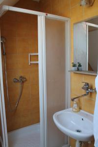 a bathroom with a shower and a sink at Vilka Tkáč in Kvačany +34 photos