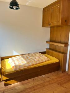 a bedroom with a bed in a room at Mountainview Flattnitz in Flattnitz