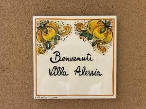 a picture of a picture of lemons on a wall at Villa Iulia Hills in Fiumefreddo di Sicilia