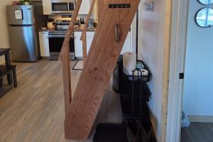 a set of stairs in a tiny house at Seward Mountain View Cabins #10 in Seward
