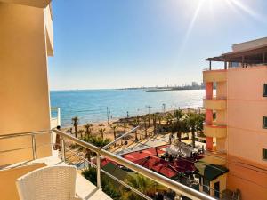 a view of the beach from the balcony of a building at H&G Seaview Apartments in Durrës