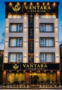a building with a sign on the front of it at Vantara Premium, Haridwar- with swimming Pool in Haridwār