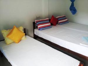 Postel nebo postele na pokoji v ubytování Calidan