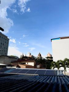 a group of solar panels on top of a building at Hotel Sol y Luna 2 in Medellín