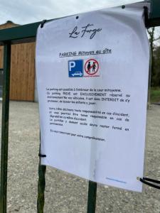 a sign for a parking hydrogen enrichment site at Gite La Forge in Rochecorbon