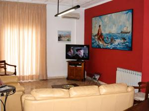 TV i/ili multimedijalni sistem u objektu Hotel La Rusticana