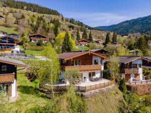 an aerial view of a house in a mountain at Chapter Two in Niedernsill