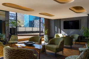 a hotel lobby with a view of the city at Crayfish Penthouse - The Onyx Cape Town in Cape Town