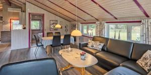 a living room with a couch and a table at VE040-Vejers-Strand-Jafdalvej-5 in Vejers Strand