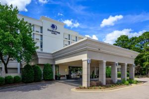 a rendering of the front of a hotel at DoubleTree by Hilton Raleigh Midtown, NC in Raleigh