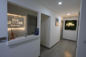 a bathroom with a sign that reads end of the circle resort at B&B Le Grazie Tropea in Tropea +26 photos