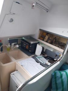 a kitchen with a sink and a counter top at Navegar no Douro - Navegação e Turismo Unipessoal, Lda in Vila Nova de Gaia +13 photos