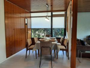 a dining room with a table and chairs at Hill Star in Mönchengladbach