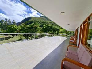 a balcony with a view of a mountain at Hotel Paraíso in San Antonio