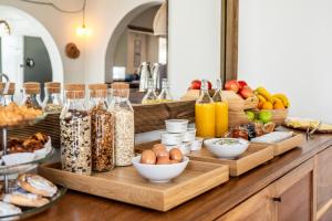 a buffet with many different types of food on a table at Outsite Ibiza - Work, Connect, Explore in Es Cana