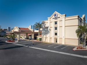 an empty parking lot in front of a hotel at Doubletree by Hilton Buena Park in Buena Park